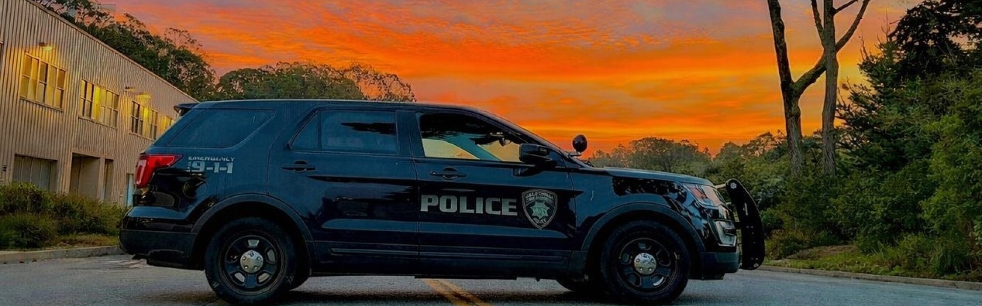 Image of UPD SUV parked on North State Dr at Sunset